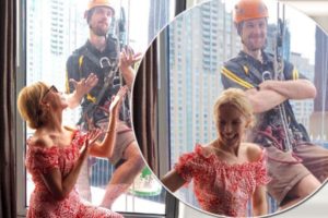 Kylie Minogue photobomb by window cleaner
